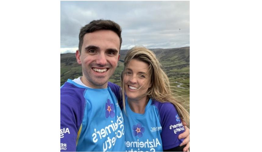 Charlie and Sophie arm in arm wearing 'Alzheimer's Society' shirts